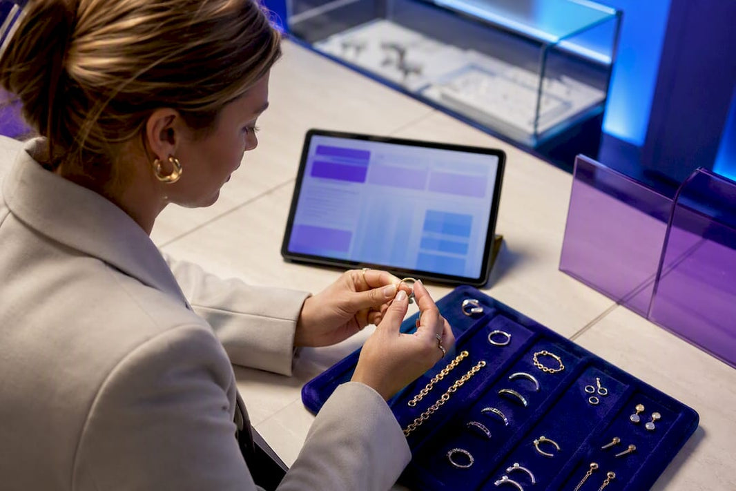 Merchandiser reviewing jewelry assortment data