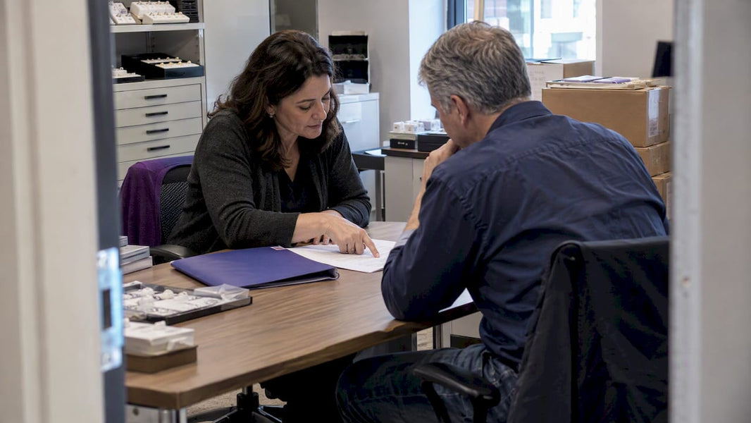 Jeweler and supplier reviewing negotiated account terms