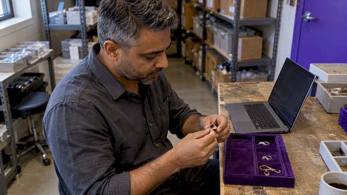 Retailer checks ring details while editing title
